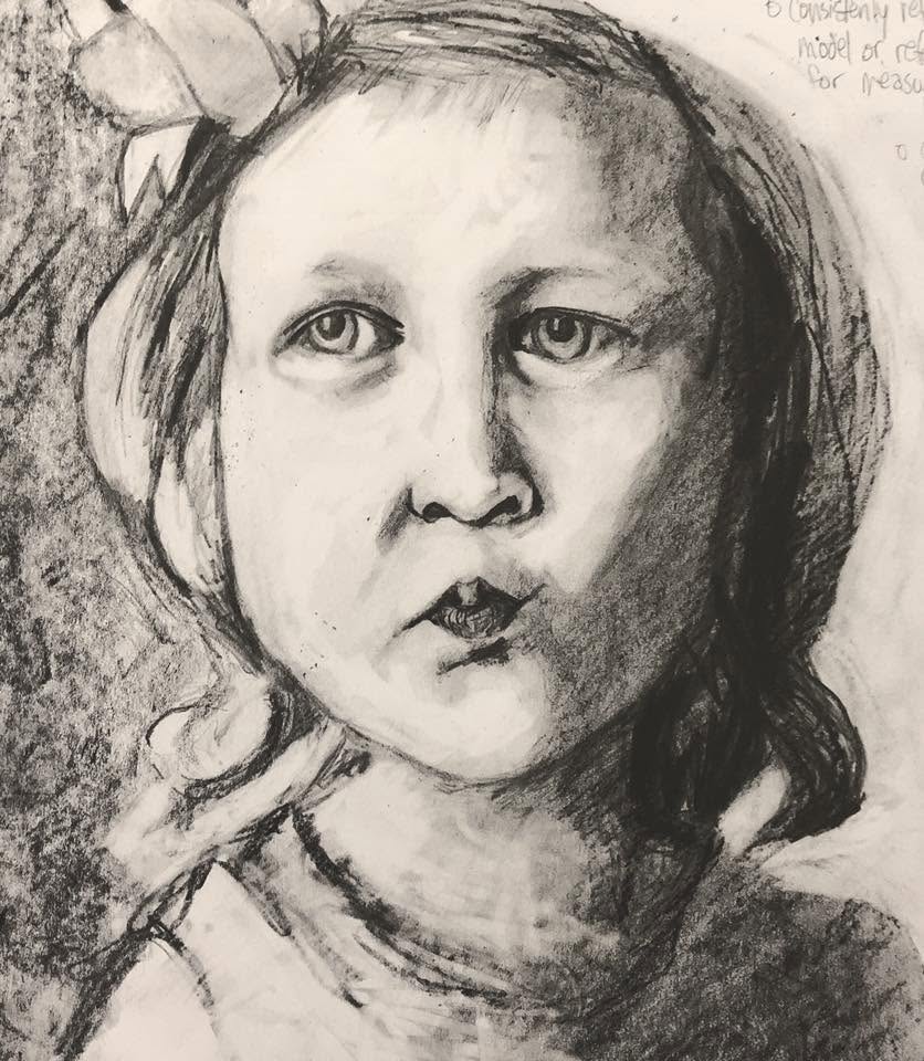 Expressive charcoal portrait study with a strongly shadowed face.